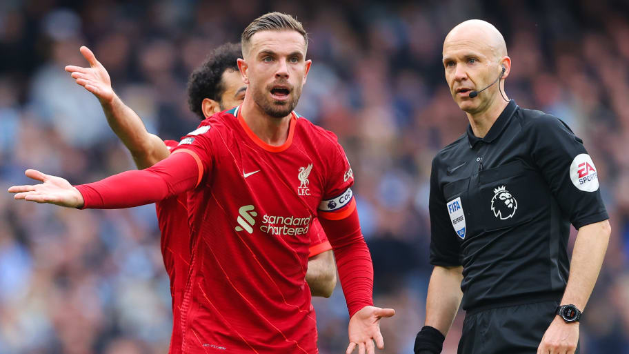 Jordan Henderson reacts to Liverpool's 2-2 draw with Man City